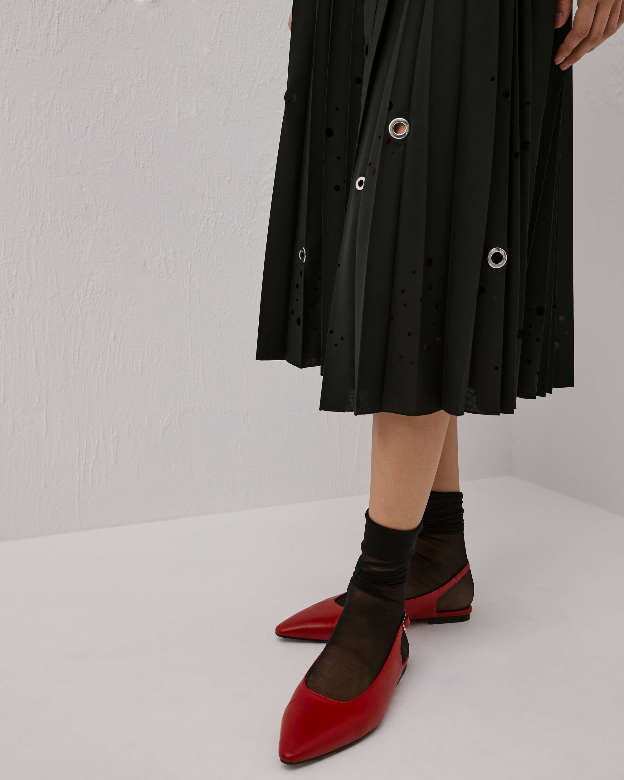 Pleated Dress With Laser Process And Metal Eyelets