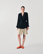 PLEATED BERMUDA SHORTS