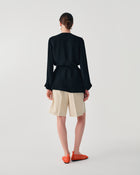 PLEATED BERMUDA SHORTS