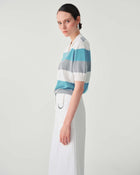 WIDE-LEG TROUSERS WITH METAL DETAIL