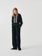 WIDE-LEG TROUSERS WITH CONTRAST WAISTBAND