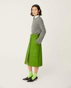 green eco-leather skirt with maxi pockets