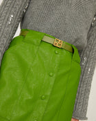 green eco-leather skirt with maxi pockets