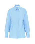 Camicia in cotone con schiena scoperta e maxi volant