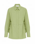 Camicia in cotone con schiena scoperta e maxi volant