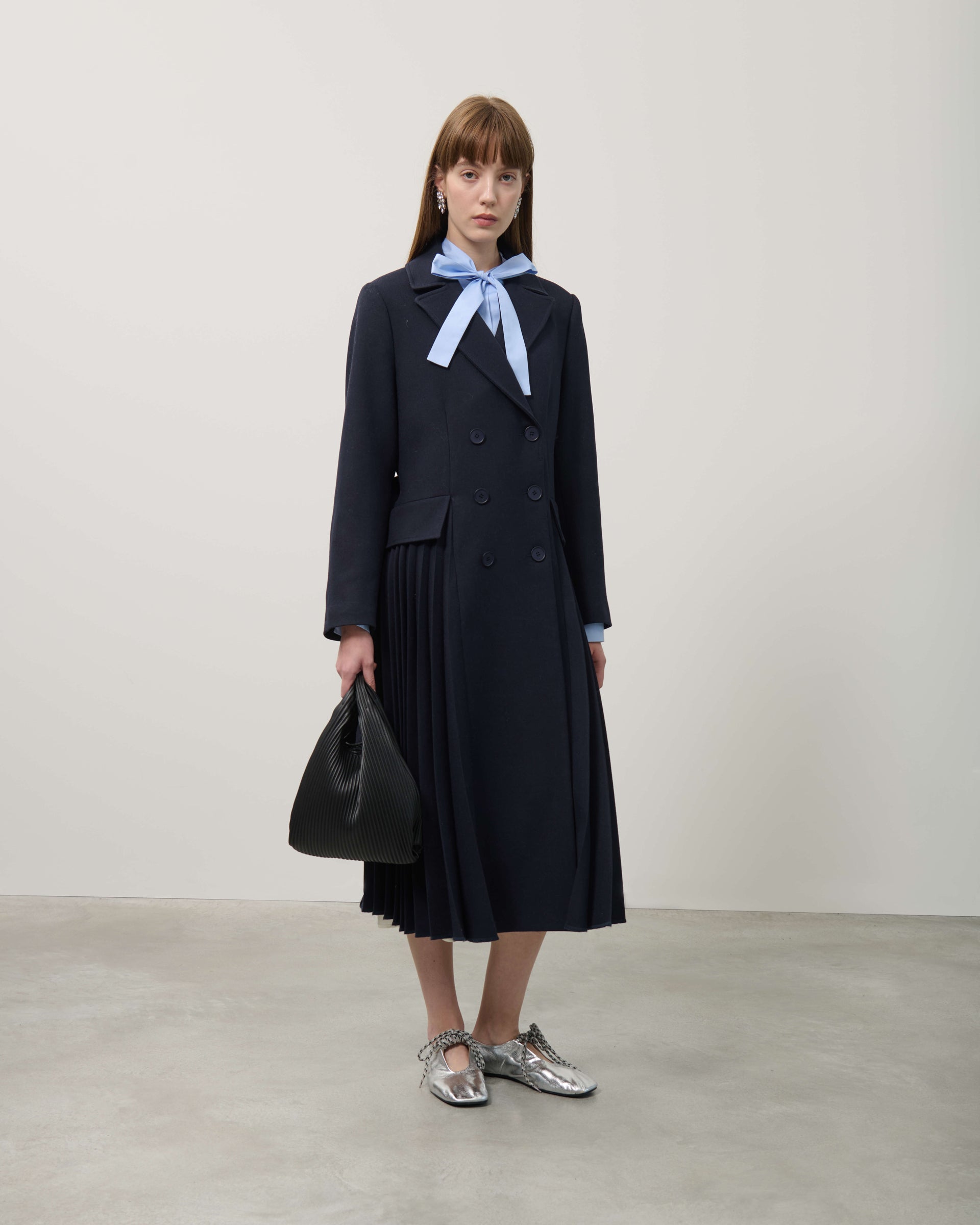 TRENCH COAT WITH PLEATED INSERTS