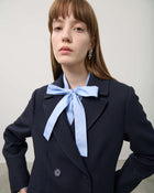 TRENCH COAT WITH PLEATED INSERTS
