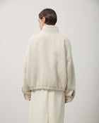 BOMBER JACKET WITH FLAPS
