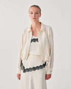CROPPED JACKET WITH ZIP AND VOLUMINOUS SLEEVES