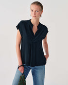 SLEEVELESS SHIRT WITH DRAPED DETAIL