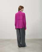 BLUSA CON COSTINE