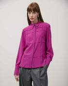 BLUSA CON COSTINE