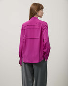 BLUSA CON COSTINE
