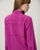 BLUSA CON COSTINE