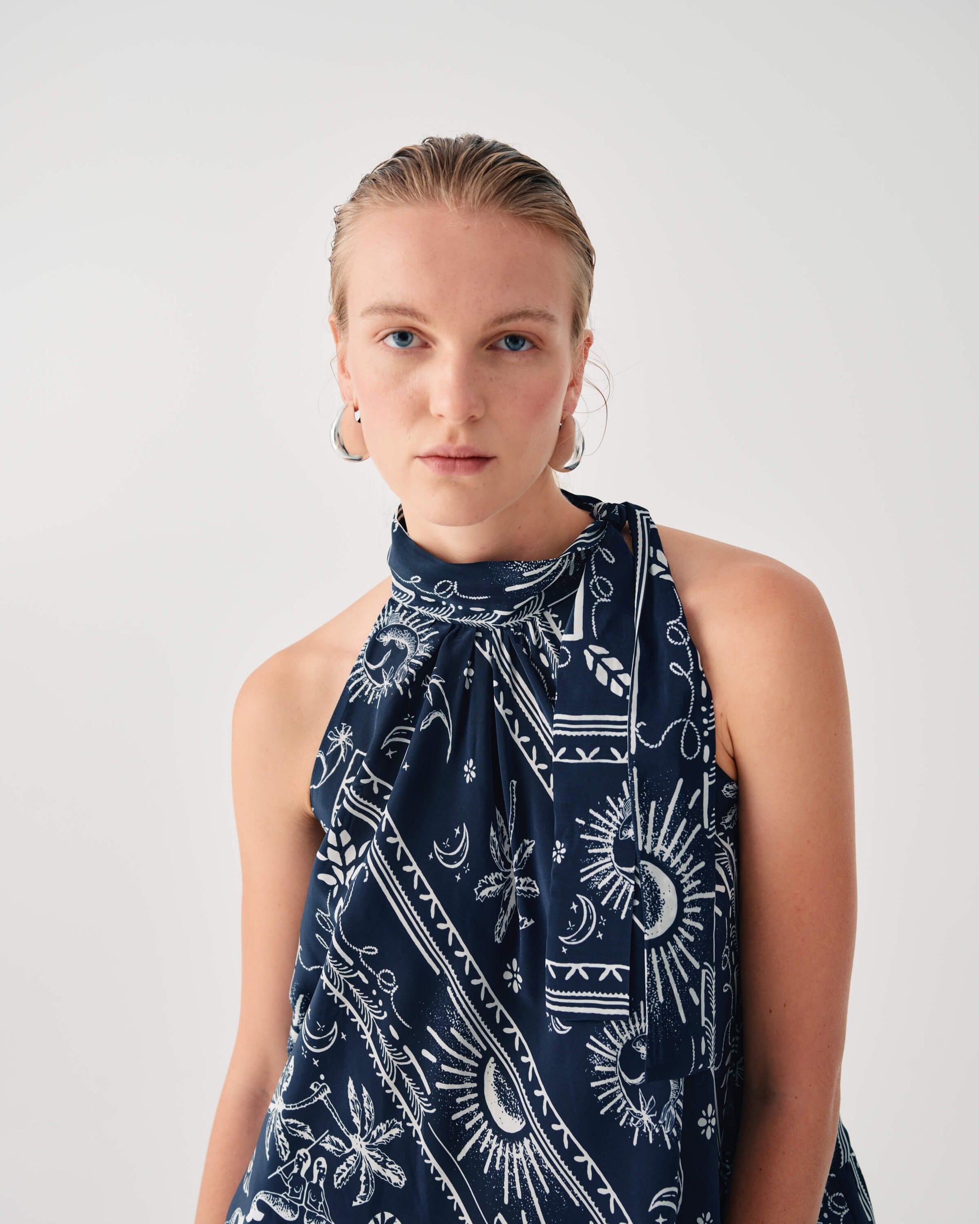 ASYMMETRICAL PRINTED SKIRT WITH BOW