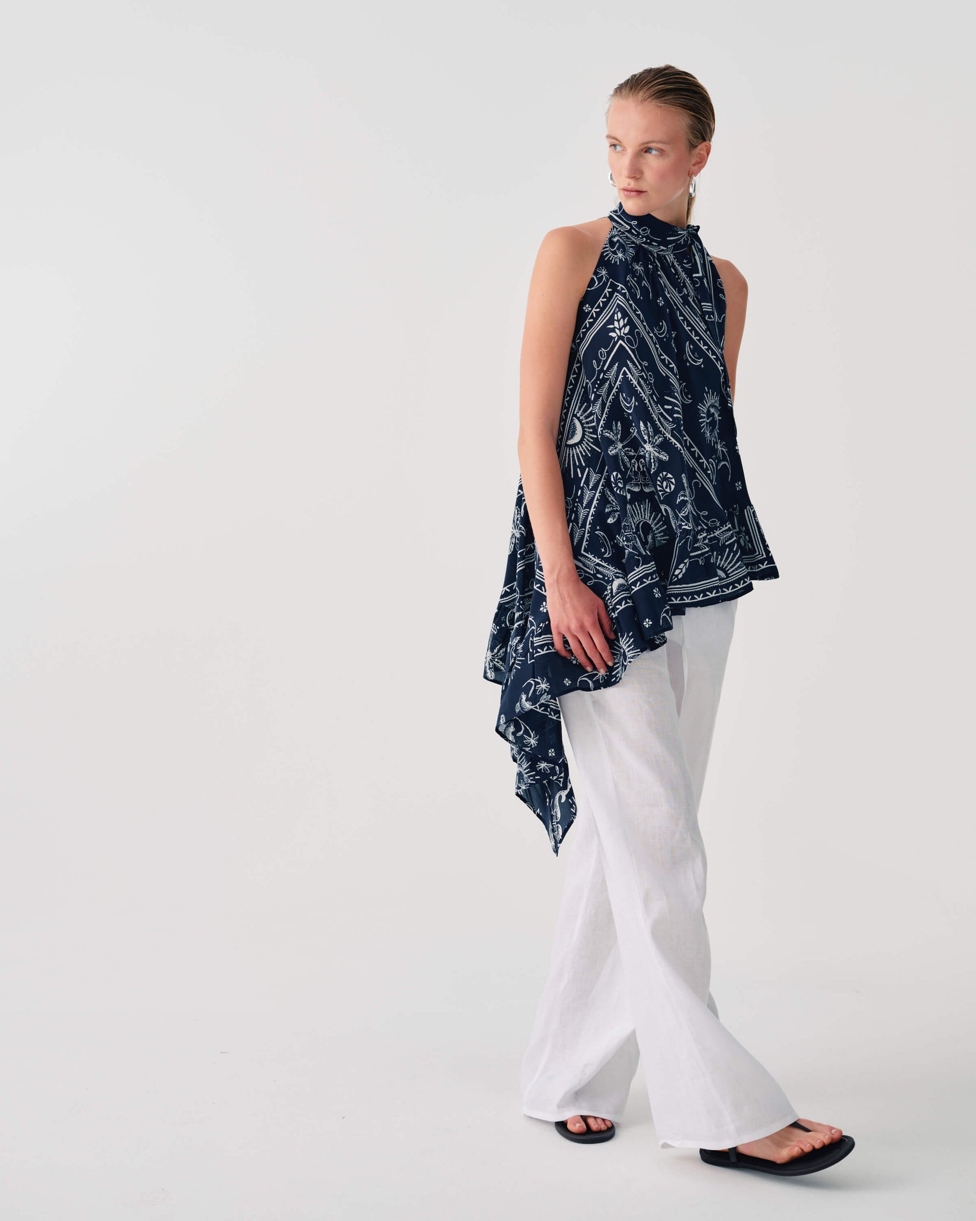 ASYMMETRICAL PRINTED SKIRT WITH BOW