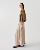 ASYMMETRIC LONG PLEATED SKIRT