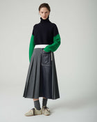 PLEATED SKIRT WITH ECO-LEATHER DETAILS