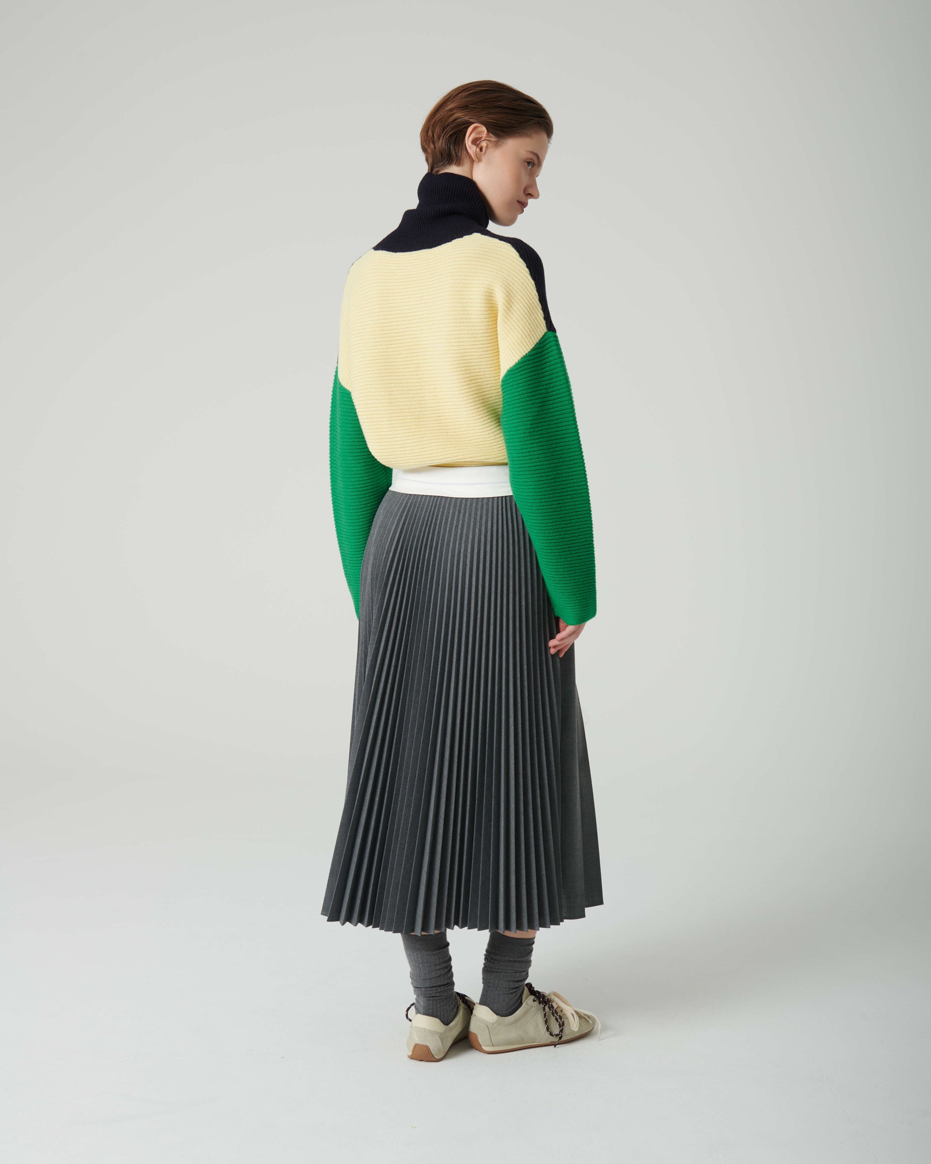 PLEATED SKIRT WITH ECO-LEATHER DETAILS