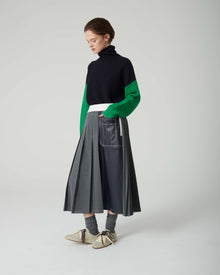 PLEATED SKIRT WITH ECO-LEATHER DETAILS