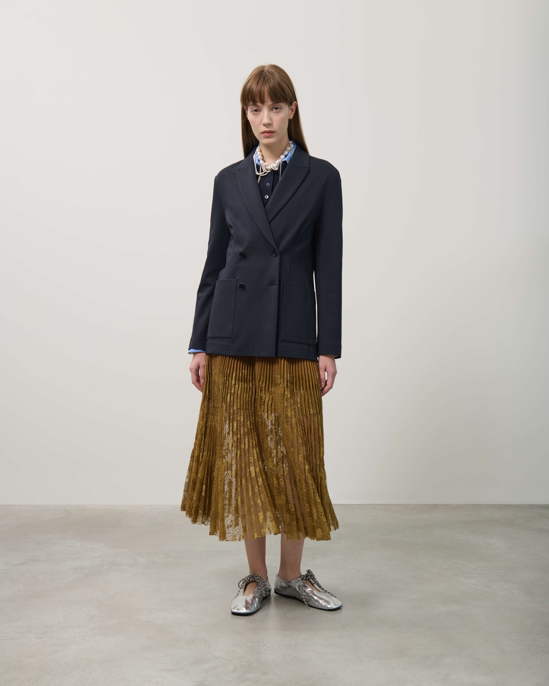 PLEATED SKIRT WITH LACE INSERTS