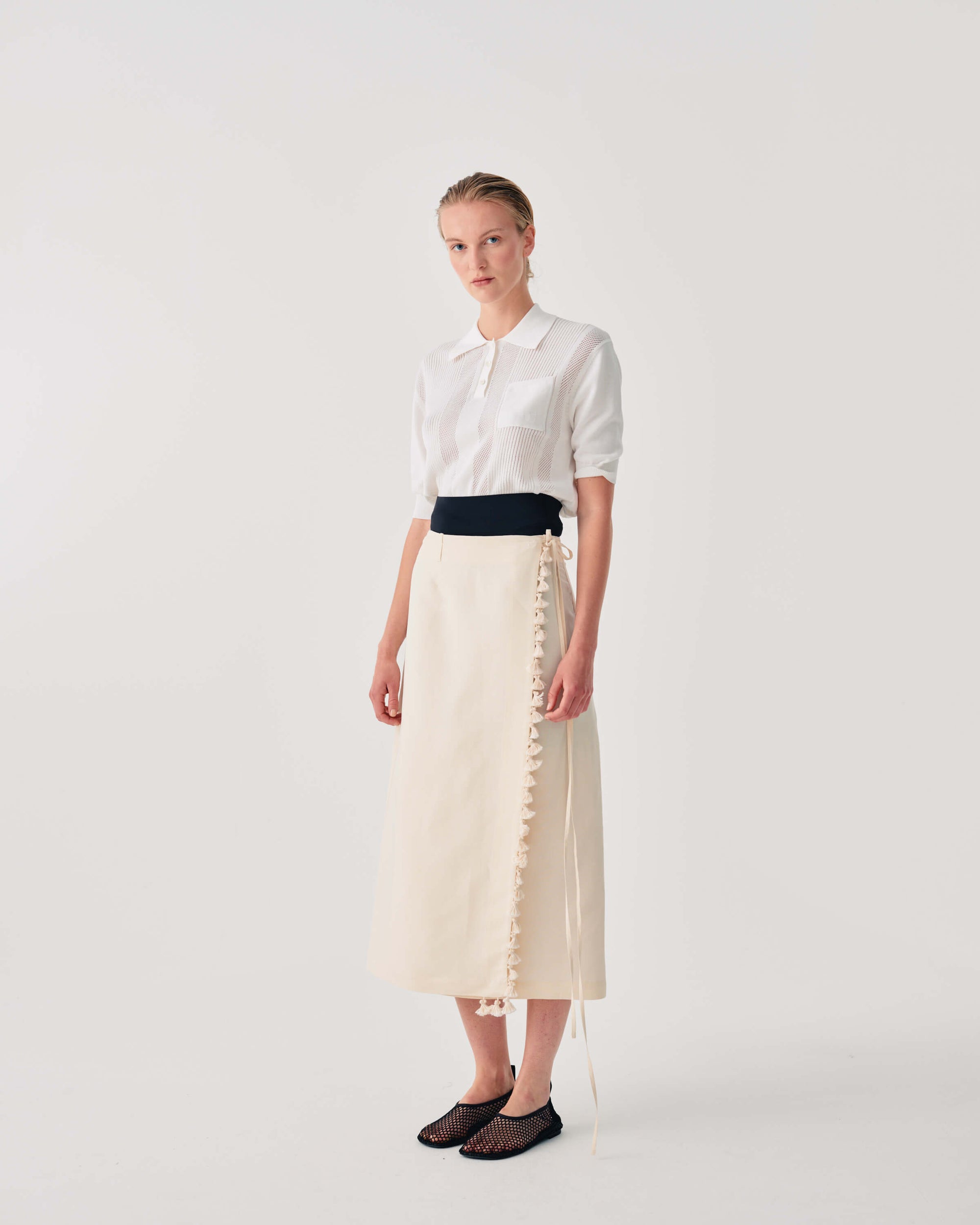 GONNA LUNGA CON CRAVATTA E FRANGE