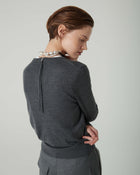 SWEATER WITH ZIP ON THE BACK