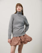TURTLENECK SWEATER WITH BRAIDS