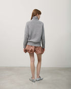 TURTLENECK SWEATER WITH BRAIDS