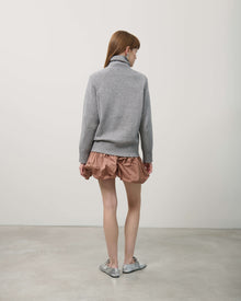 TURTLENECK SWEATER WITH BRAIDS