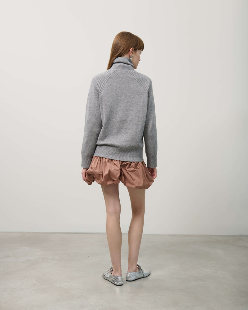 TURTLENECK SWEATER WITH BRAIDS