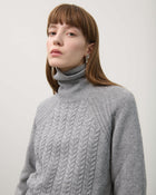 TURTLENECK SWEATER WITH BRAIDS