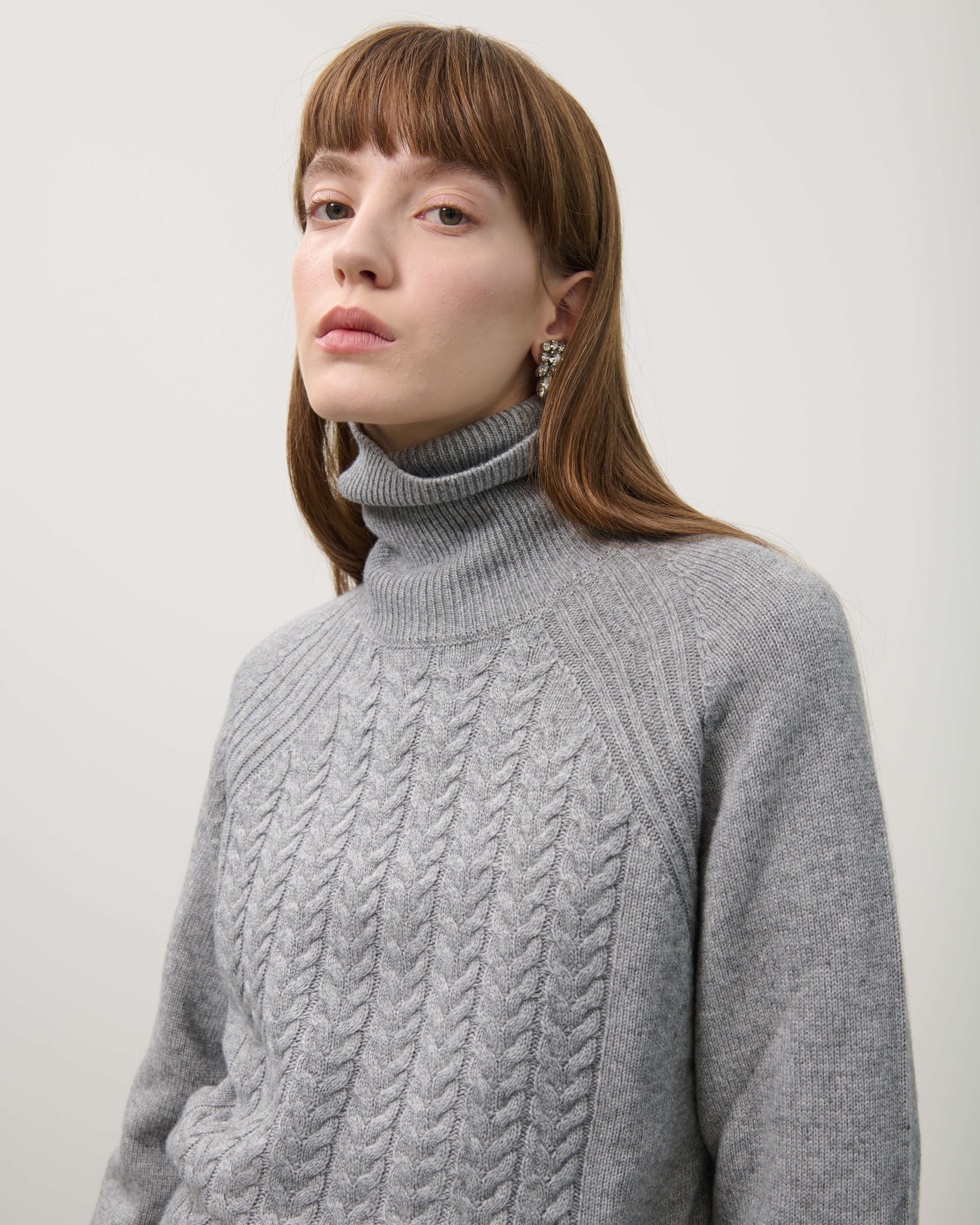 TURTLENECK SWEATER WITH BRAIDS