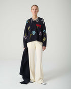 SWEATER WITH NEEDLE FLOWERS