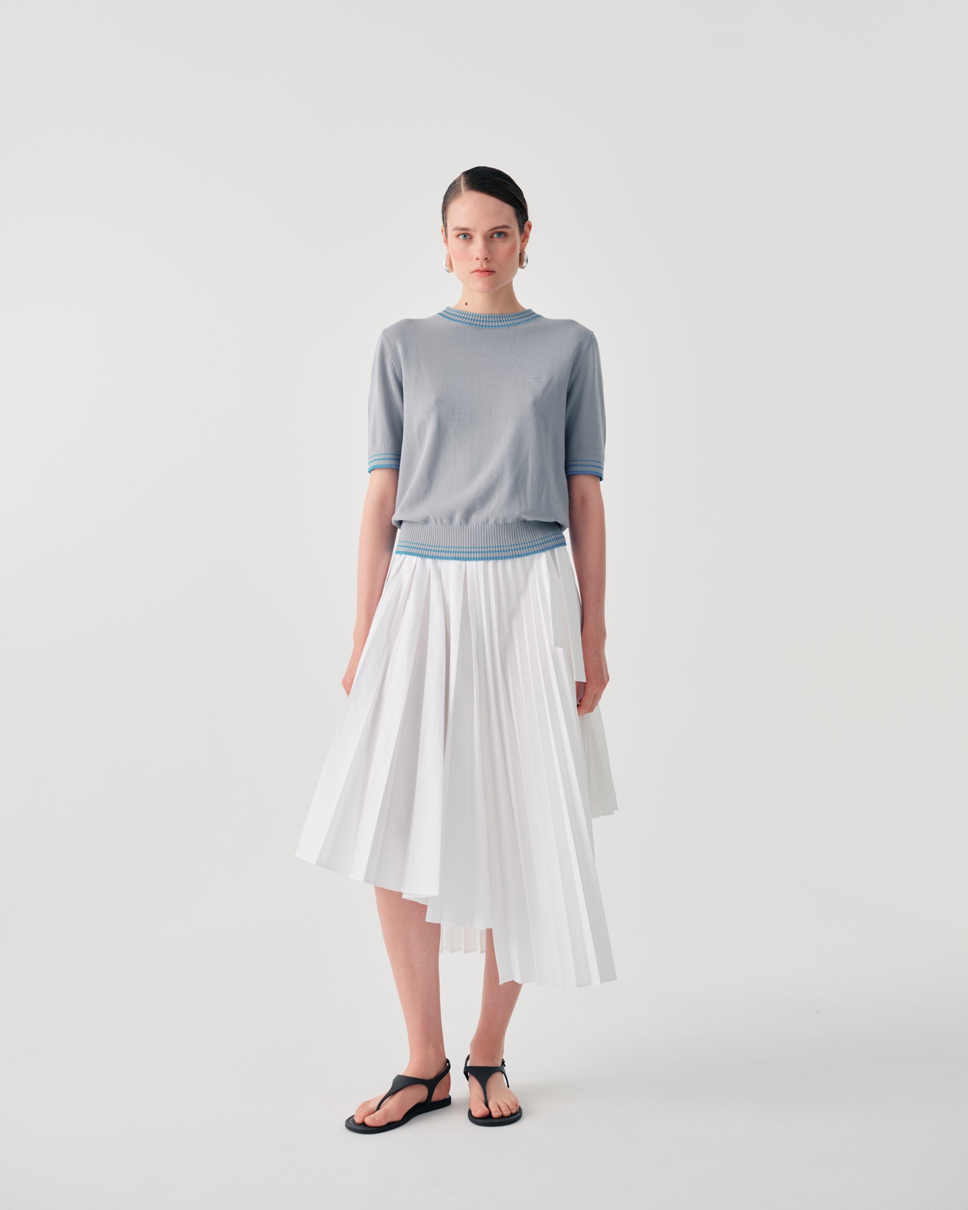 ASYMMETRIC PLEATED SKIRT