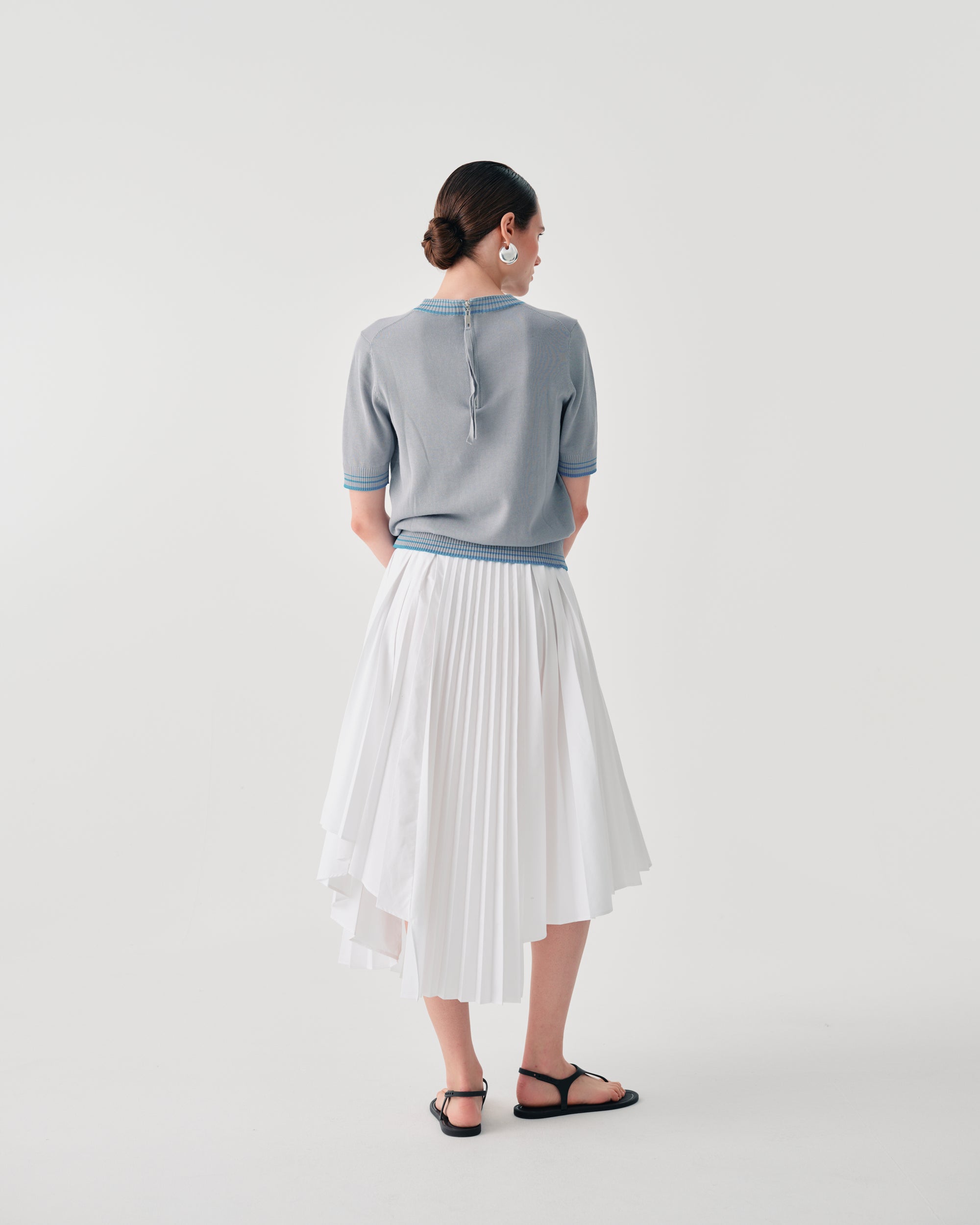 ASYMMETRIC PLEATED SKIRT