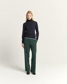 TROUSERS WITH FLUID LEG