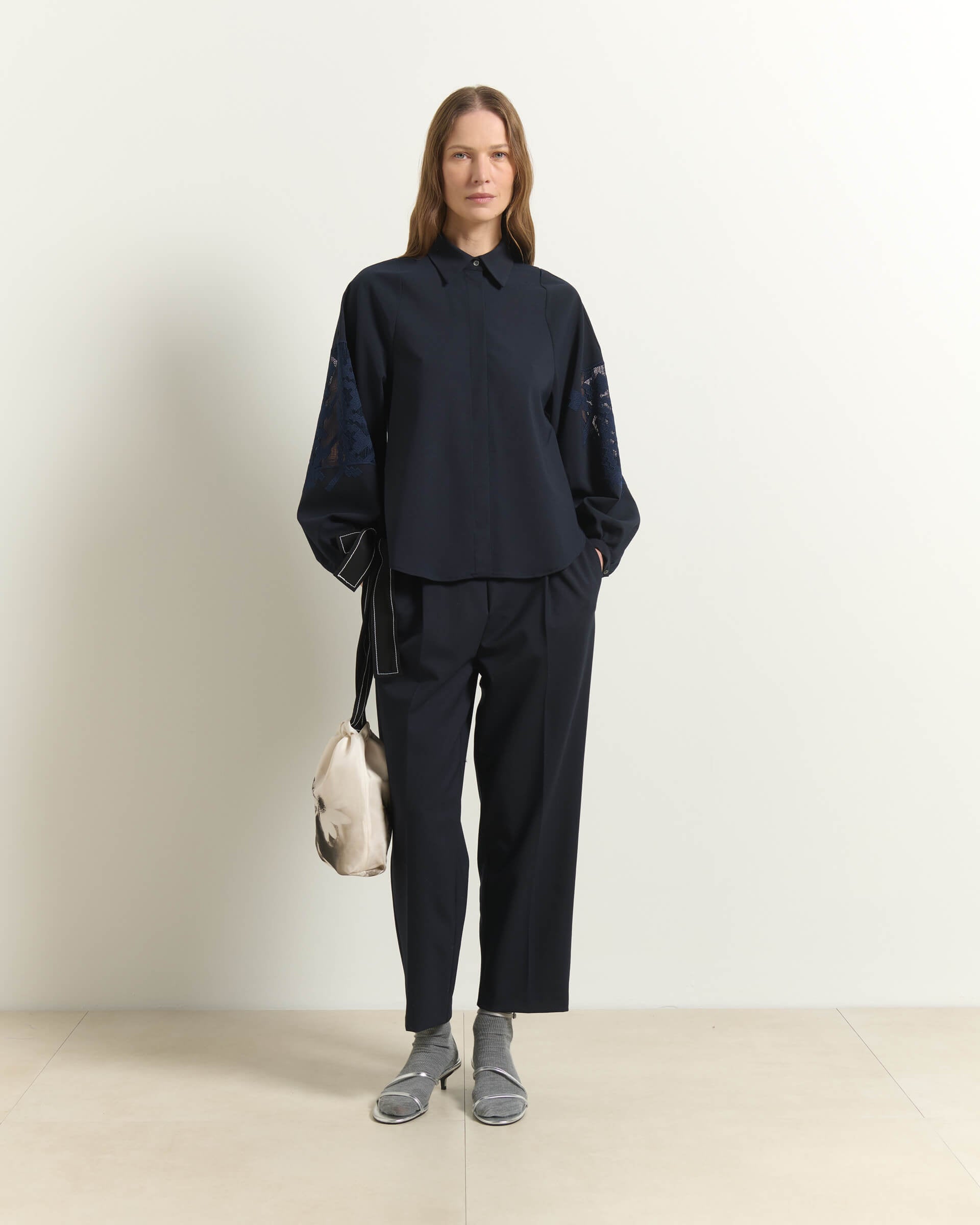 TROUSERS WITH ELASTIC WAISTBAND AND METAL DETAILS