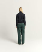 TROUSERS WITH FLUID LEG