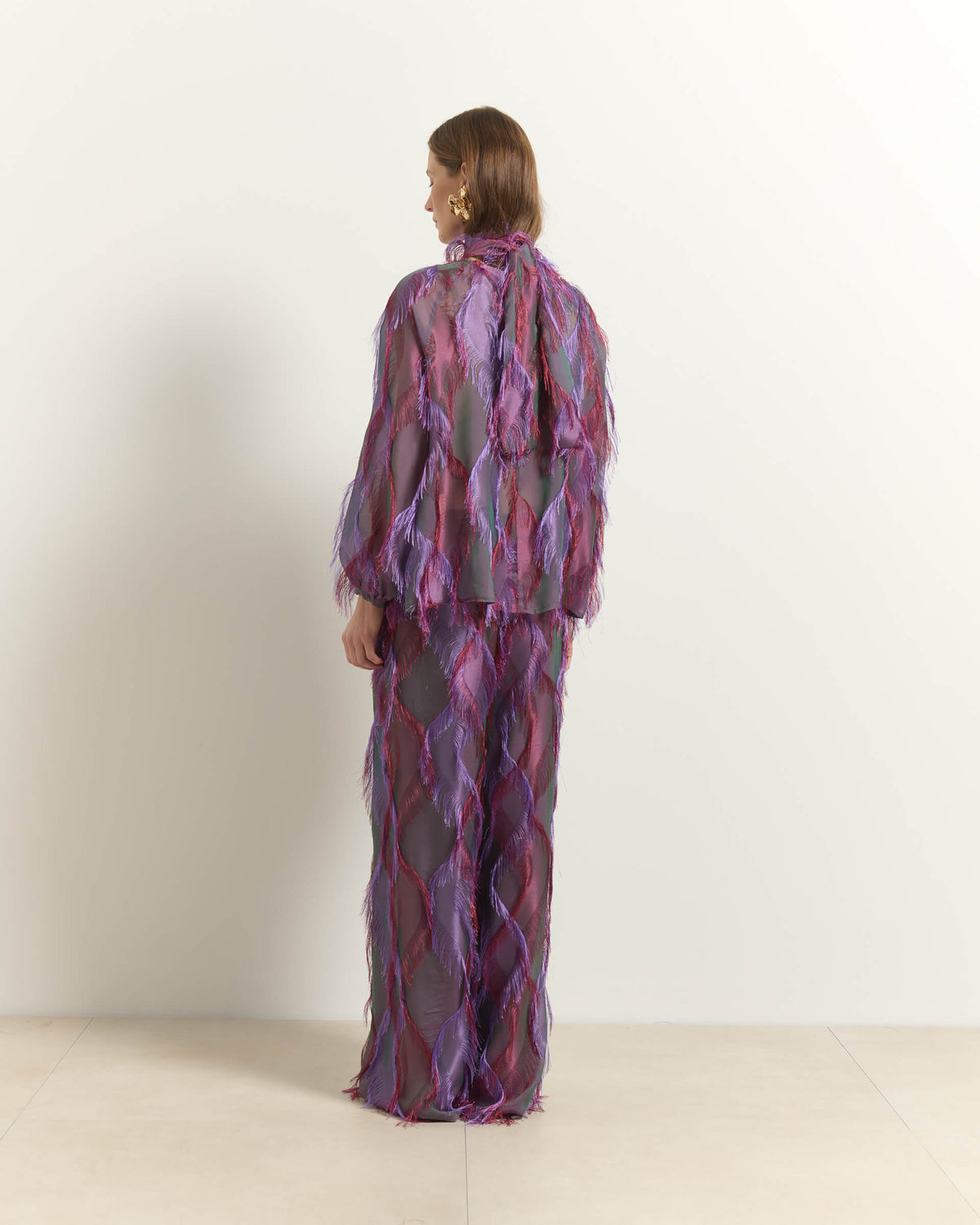 CAMICIA CON DETTAGLI FRANGIATI