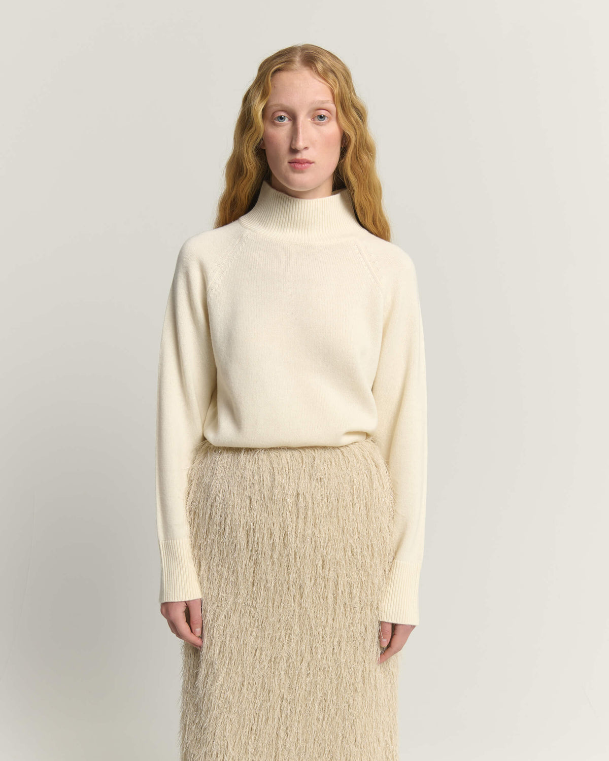 MAGLIONE DOLCEVITA IN LANA CON SPALLE RAGLAN