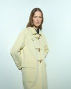 DOUBLE-FACED WOOL AND CASHMERE COAT WITH TOGGLE FASTENING