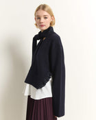 V-NECK SWEATER WITH RUFFLE DETAILS AND LAYERED HEM
