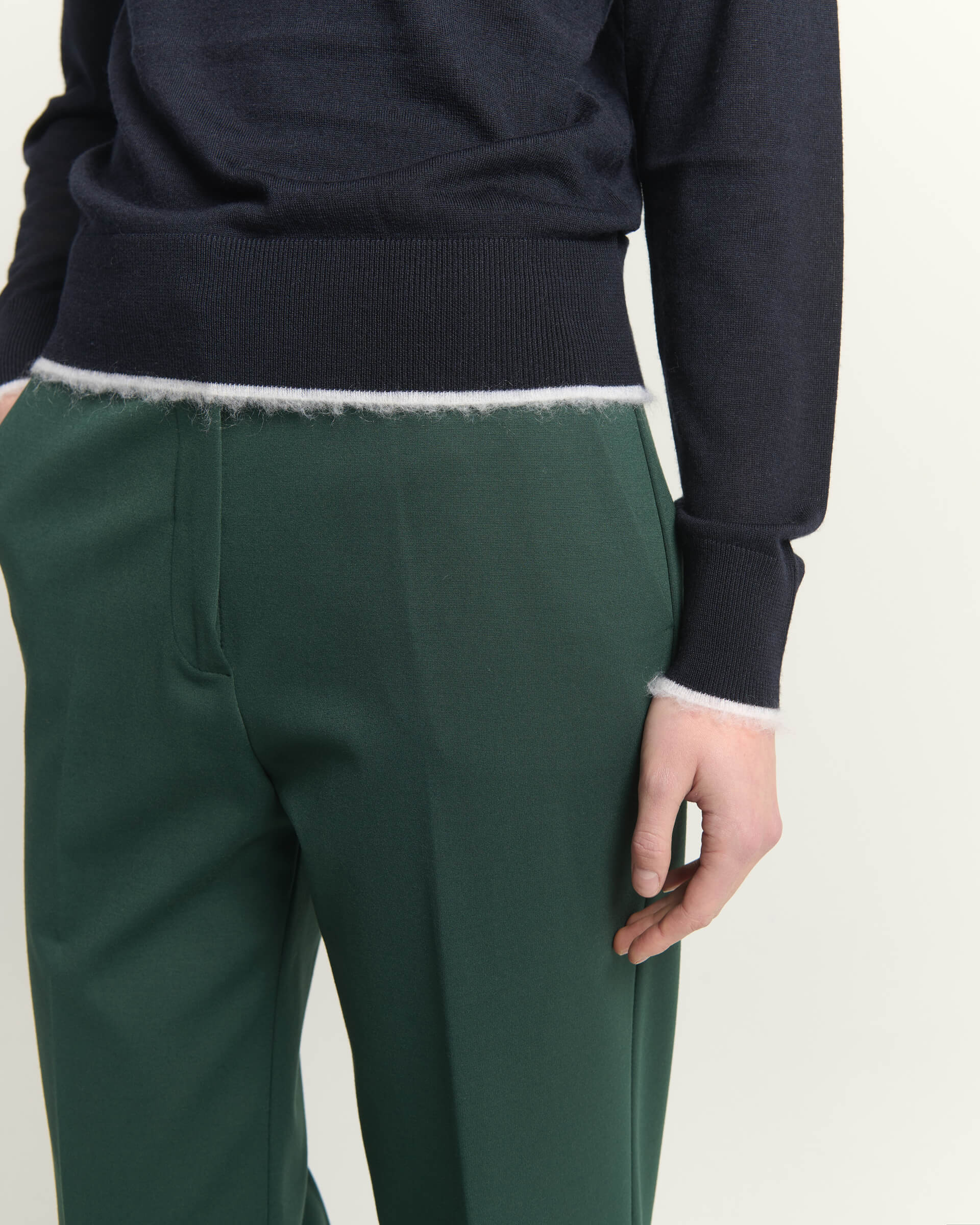TROUSERS WITH FLUID LEG