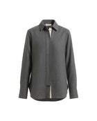 CAMICIA CON ABBOTTONATURA NASCOSTA
