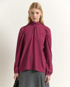 BLUSA CON FIOCCO ANNODATO A COLLO ALTO