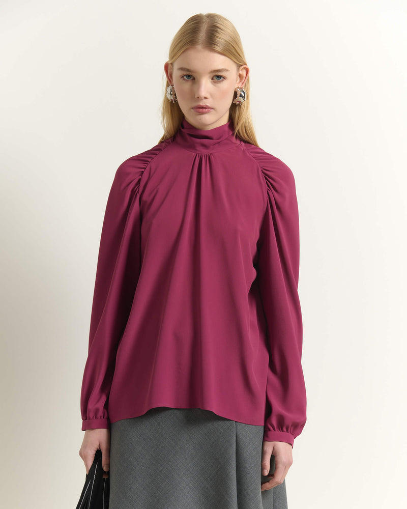 BLUSA CON FIOCCO ANNODATO A COLLO ALTO