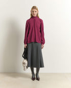 BLUSA CON FIOCCO ANNODATO A COLLO ALTO