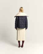 PIUMINO CORTO IN NYLON CON VERA IMBOTTITURA IN PIUMA