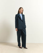 TAILORED TROUSERS WITH DOUBLE PLEATS